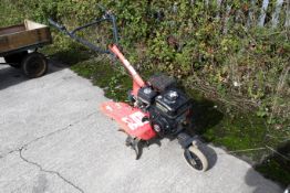 A petrol-powered cultivator or garden tilling machine. With a Loncin 196cc engine. Body size (mm)