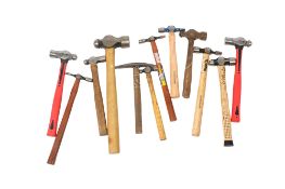 A group of assorted hammers All items in this auction are sold as seen, We are unable to provide