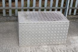 A large checker plate metal storage box, H50cm x W92cm x D53cm All items in this auction are sold as