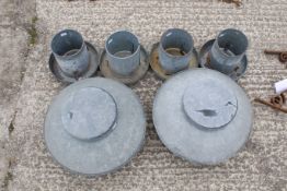 Six galvanised metal bird feeders. Two larger (H28cm C32cm) with lids, and four smaller (H20cm