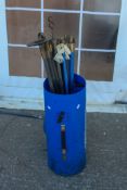 A collection of drain rods in a blue plastic container. All items in this auction are sold as