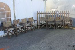 A collection of eight vintage folding garden chairs. Having wooden frames and fabric setas and