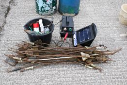 An electric fence. To include a Rutland ESS610 solar energiser, Hotline battery, and approximately