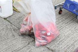 Two sacks of 5M red anchor-rail ratchet straps. Approximately 20-25 in total. All items in this
