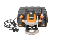 An electric Worx Plunge Router. With various attachments, within heavy duty plastic case. Case H37cm