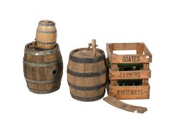 Two coopered oak cider barrels and a Coates crate containing three bottles. Together with an smaller