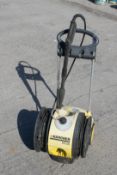 A Karcher K6.50 pressure washer with lance.