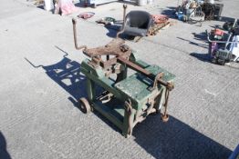 A vintage set of weighting scales. Cast iron within a mobile wooden frame. H97cm. All items in