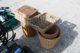 A collection of nine assorted wicker baskets. Max. H36cm All items in this auction are sold as seen,