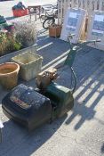 Webb 18 cylinder petrol lawnmower. With grass collector All items in this auction are sold as