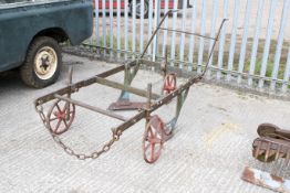 A Victorian wrought iron pull along horse plough. H47cm x W270cm x D91cm All items in this auction