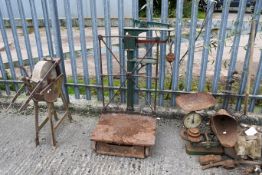 A vintage set of sack scales painted green with some weights. H120cm All items in this auction are