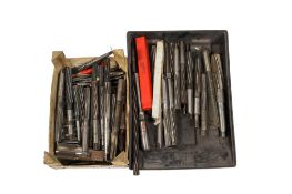 Two boxes of assorted lathe tool metal working reamers.