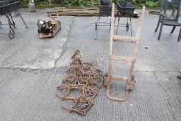 A set of vintage wooden sack trucks and a chain harrow mat. Sack truck height 115cm. All items in