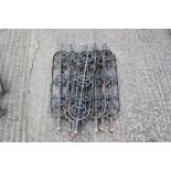 Eight decorative cast iron staircase balusters or spindles. Painted black. H94cm W17cm. All items in