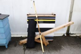 A Sebastian Flute 'Optimo' bow. H162cm. Together with 14 arrows, mostly Easton Platinum Plus,