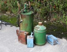 A collection of vintage metal petrol and oil cans. To include a 25L Castrol container, a Castrol