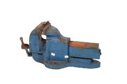 A large Record bench vice. Painted blue. W20cm D58cm H27cm. All items in this auction are sold as