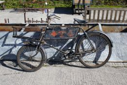 A vintage Raleigh 'butcher's boy' delivery bike. All items in this auction are sold as seen, We