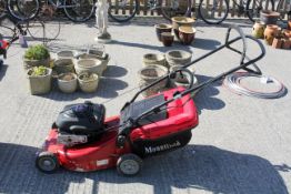 Mountfield rotary petrol lawnmower and grass collector All items in this auction are sold as seen,