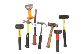 A group of assorted hammers All items in this auction are sold as seen, We are unable to provide