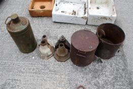 An assortment of vintage and antique metalware. To include a Castrol oil can, four iron hoppers, a
