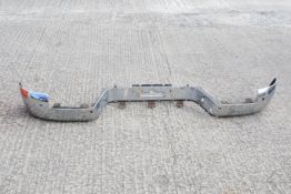 A 2014 Volkswagen Amarok chrome rear bumper. All items in this auction are sold as seen, We are