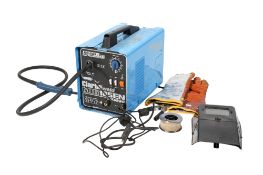 A Clarke Weld Mig 105EN Turbo welder. Together with mask, gloves and welding wire. H31cm L43cm