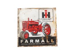 An International Harvester Farmall Red tractor enamel advertising sign. Single sided. H30.5cm W30.