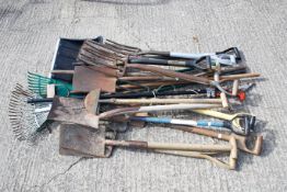 A job lot garden hand tools. Including spades, forks and racks, etc. All items in this auction are