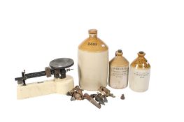 Three flagons, a set of Gallenkamp slide scales and an assortment of taps. Flagons include