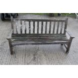 A Swan Seats teak garden bench. With armrests, horizontal seat base slats, and vertical backrest