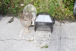 A collection of ornate wirework garden baskets and similar items. Together with a glass greenhouse
