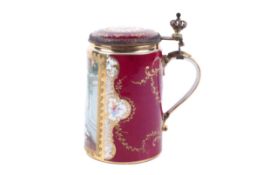 A 19th century Vienna porcelain lidded tankard.