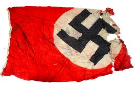 A large WWII Swastika German building flag. Circa 176cm x 210cm - torn at one end.