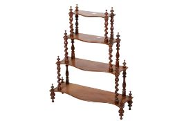A 20th century mahogany whatnot four tiered stand.