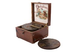 A late 19th century 'Polyphon' musical box and seven discs.