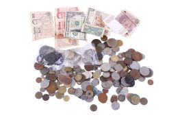 A group of assorted world coins and banknotes.