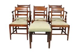 A set of six Georgian inlaid mahogany dining chairs.