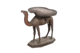 An early 20th century Anglo Indian hardwood occasional table modelled as a standing camel.