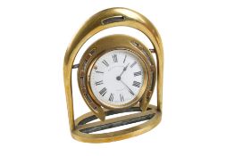 A 20th century brass clock by Tilley & Sons of Dorchester.