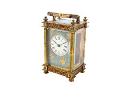 A late 19th century gilt brass carriage clock.