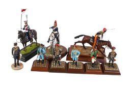 A group of hand painted lead and resin military figures.