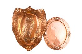 A late 19th/early 20th century copper dish and a wall plaque.