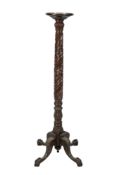 A 19th century mahogany torchère stand.