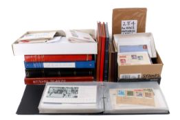 A large collection of assorted stamps in a suitcase.