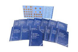 Sixteen Whitman folders,