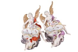 A pair of 19th/20th century Continental hold water stoops.