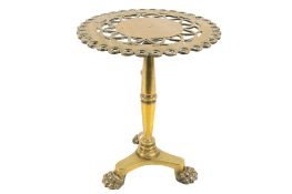 A Victorian brass trivet.