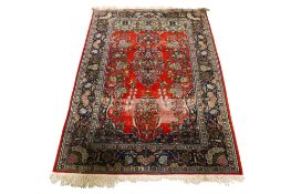 A small Kashmiri rug.